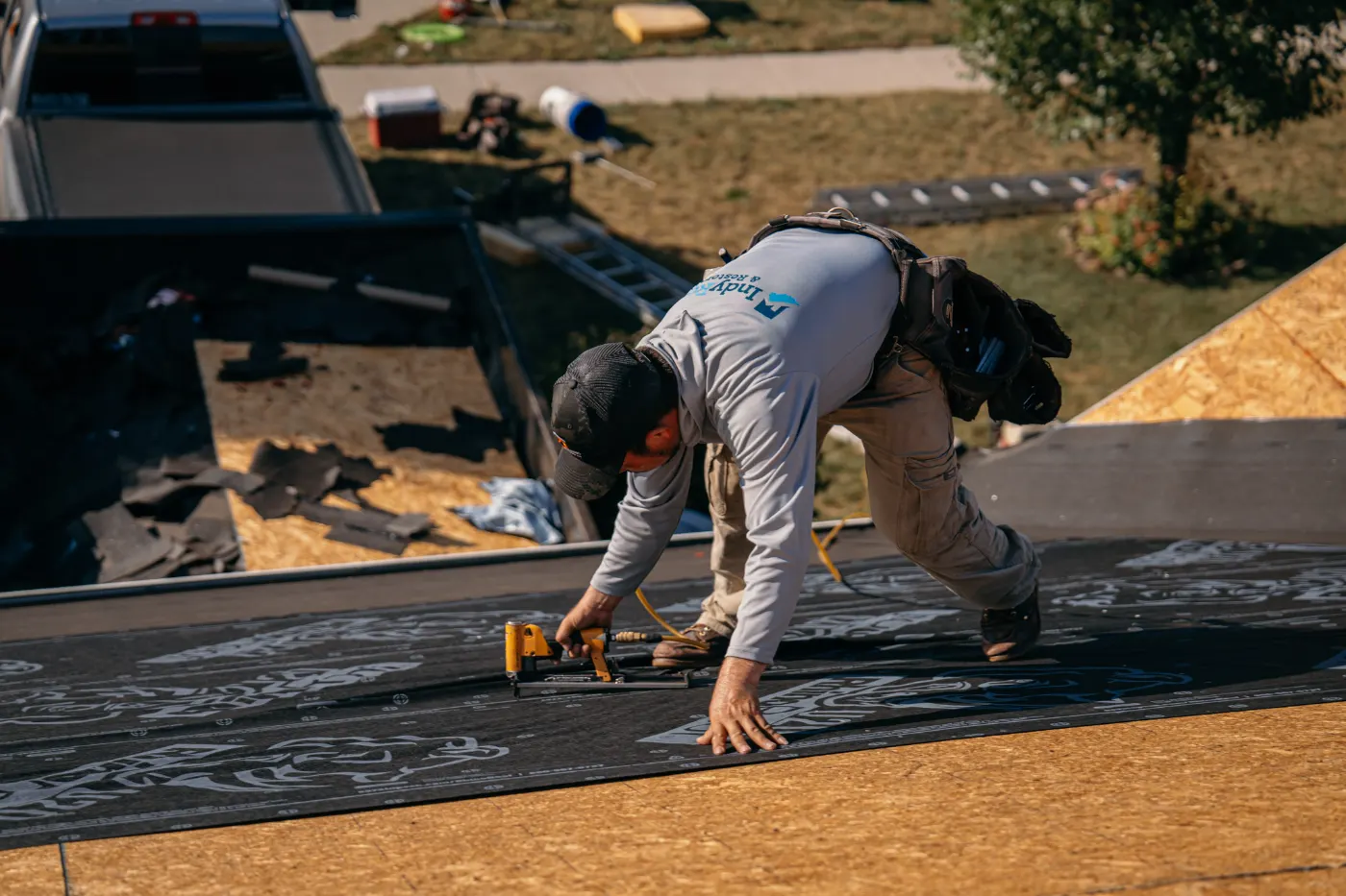 Tarping and dry-in on a Cayuga commercial roof